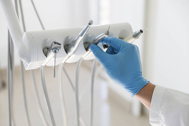 Professional Dental Implants technician working in Golden Gate, FL